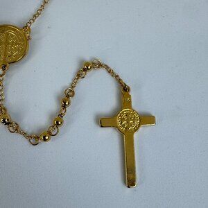 Gold-tone Stanless Steel St. Benedict Rosary. 18 inches long.